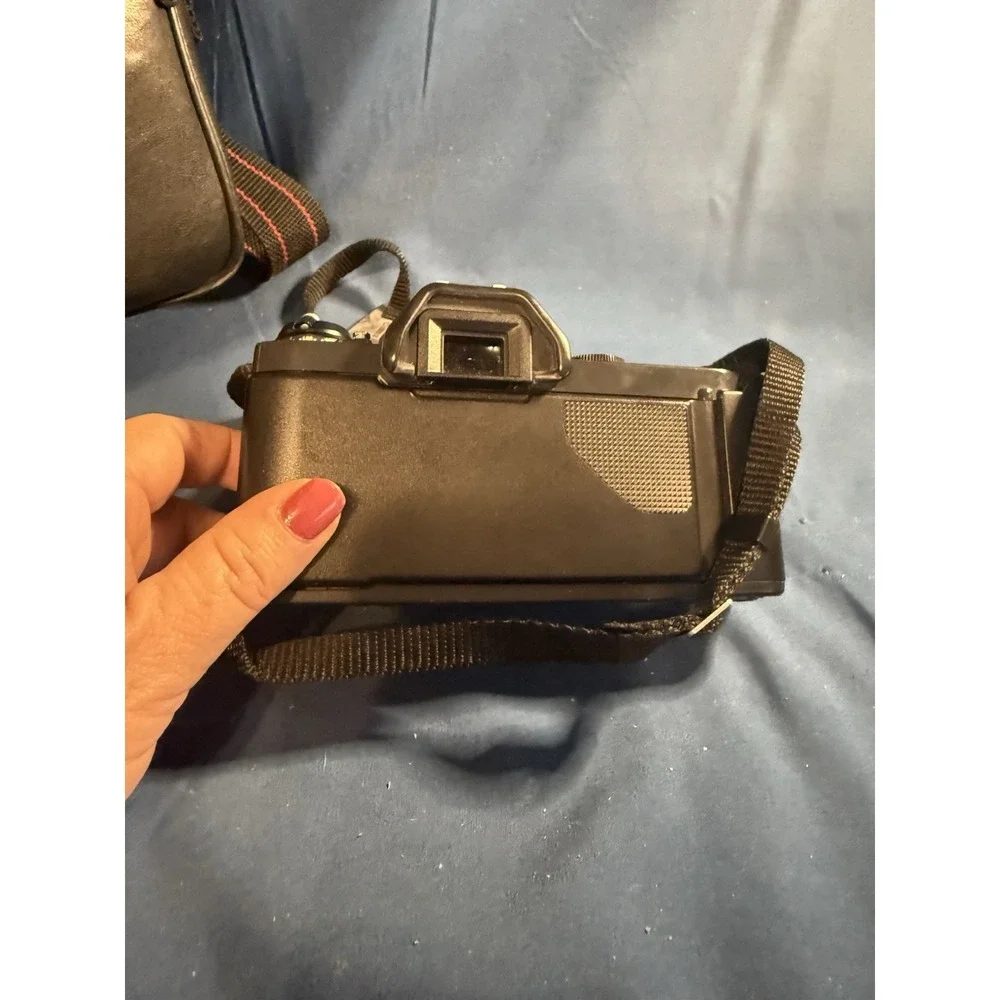 Canon T50 camera Vintage With Bag Will Power On Not Tested With Film